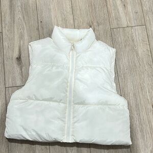 White puffer vest with zip up front